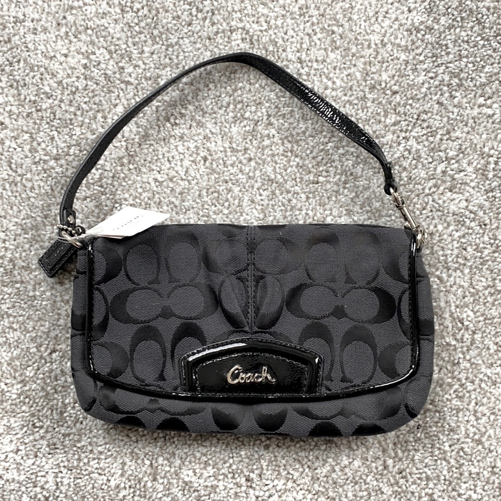 Brand new with tags COACH clutch